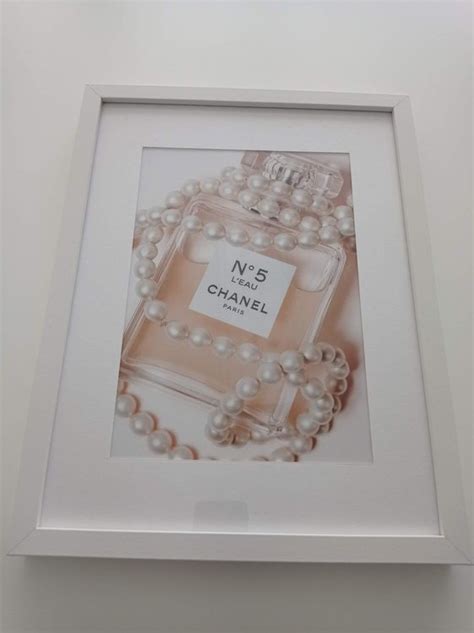 chanel bild mit rahmen gold